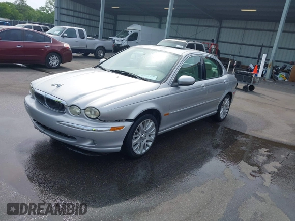 2003 Jaguar X-Type 2.5L Manual with VIN SAJEA51D33XC93300, listed as a IAAI auction lot 42048118 with 116,939 mi miles and . Bid and sale history available at DreamBid. Image 2.