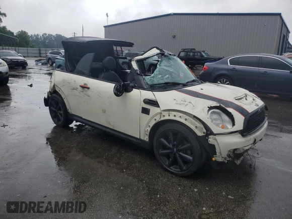 2014 MINI Convertible S с VIN WMWZP3C5XET706231, выставлен на аукционе Copart как лот 55610615 с пробегом 70 416 миль миль и Списание • Salvage title. История ставок и продаж доступна на DreamBid. Изображение 4.