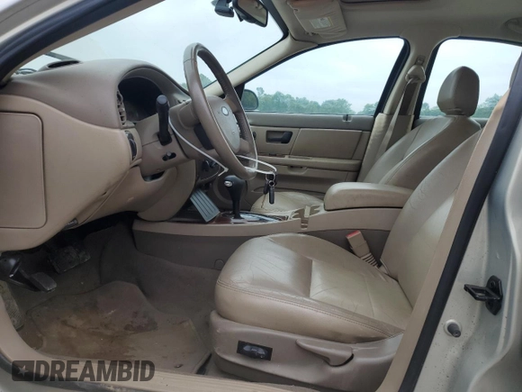 2006 Ford Taurus SEL with VIN 1FAFP56U86A194072, listed as a Copart auction lot 63779615 with 77,377 mi miles and Salvage title. Bid and sale history available at DreamBid. Image 7.