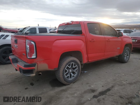 2015 GMC Canyon 4WD SLE with VIN 1GTG6BE30F1136918, listed as a Copart auction lot 82442884 with 102,361 mi miles and Salvage Title. Bid and sale history available at carsss.com. Image 3.