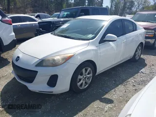 2013 Mazda 3 i SV with VIN JM1BL1TF9D1723965, listed as a IAAI auction lot 41934742 with 201,712 mi miles. Bid and sale history available at carsss.com. Image 2.