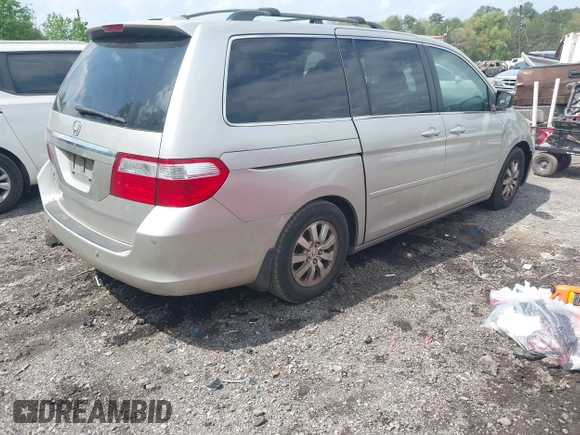 2007 Honda Odyssey Touring with VIN 5FNRL38877B002351, listed as a IAAI auction lot 41930355 with 254,929 mi miles. Bid and sale history available at carsss.com. Image 4.