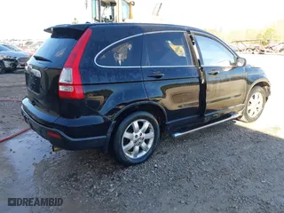 2007 Honda CR-V EX with VIN JHLRE38557C016250, listed as a IAAI auction lot 41700926 with 211,584 mi miles. Bid and sale history available at carsss.com. Image 4.