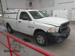 2014 Ram 1500 Tradesman z VIN 3C6JR7DT6EG285109, wystawiony jako IAAI lot #42306741 z przebiegiem 218 286 mil mil oraz . Historia ofert i sprzedaży dostępna na DreamBid. Obrazek 1.