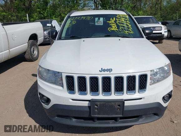 2012 Jeep Compass Latitude with VIN 1C4NJCEA7CD639298, listed as a IAAI auction lot 42121430 with 166,409 mi miles. Bid and sale history available at carsss.com. Image 6.