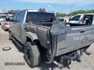 2022 Ram 1500 Rebel z VIN 1C6SRFLT2NN351050, wystawiony jako IAAI lot #41976882 z przebiegiem 59 490 mil mil oraz . Historia ofert i sprzedaży dostępna na DreamBid. Obrazek 3.
