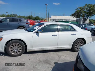 2014 Chrysler 300 with VIN 2C3CCAET6EH173381, listed as a IAAI auction lot 42158270 with 124,551 mi miles. Bid and sale history available at carsss.com. Image 14.
