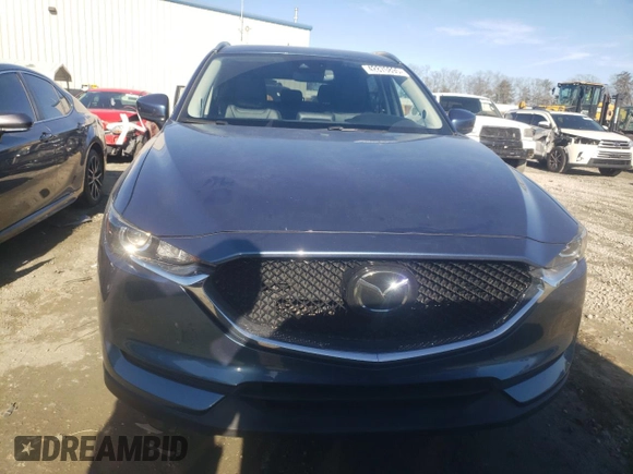 2020 Mazda CX-5 Touring with VIN JM3KFACM8L0774374, listed as a Copart auction lot 42870895 with 71,925 mi miles and Salvage Title. Bid and sale history available at DreamBid. Image 5.