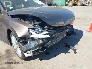 2011 Volkswagen Jetta SEL z VIN 3VWLX7AJXBM300389, wystawiony jako IAAI lot #41760720 z przebiegiem 249 087 mil mil oraz . Historia ofert i sprzedaży dostępna na DreamBid. Obrazek 6.