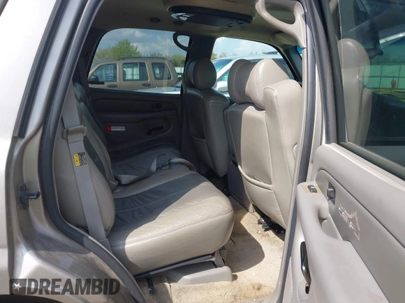 2002 GMC Yukon Denali z VIN 1GKEK63U52J202688, wystawiony jako IAAI lot #41778920 z przebiegiem 354 202 mil mil oraz . Historia ofert i sprzedaży dostępna na DreamBid. Obrazek 8.