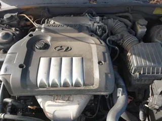 2004 Hyundai Sonata with VIN KMHWF25S84A944266, listed as a IAAI auction lot 41723386 with 159,849 mi miles. Bid and sale history available at carsss.com. Image 10.