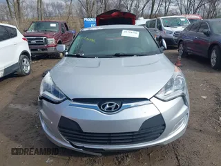 2017 Hyundai Veloster with VIN KMHTC6AD6HU310694, listed as a IAAI auction lot 41734446 with 99,432 mi miles. Bid and sale history available at carsss.com. Image 12.