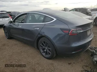 2018 Tesla Model 3 Long Range Battery z VIN 5YJ3E1EB3JF103804, wystawiony jako Copart lot #83752134 z przebiegiem 128 507 mil mil oraz Szkoda całkowita • Salvage title. Historia ofert i sprzedaży dostępna na DreamBid. Obrazek 2.