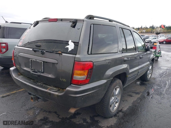 2004 Jeep Grand Cherokee Limited with VIN 1J4GW58N34C399673, listed as a IAAI auction lot 41976505 with 194,005 mi miles. Bid and sale history available at carsss.com. Image 4.