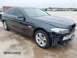 2013 BMW 5 Series 528i xDrive with VIN WBAXH5C50DDW15574, listed as a IAAI auction lot 41572993 with 59,188 mi miles. Bid and sale history available at carsss.com. Image 1.
