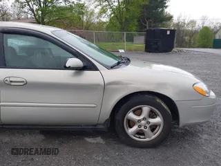 2003 Ford Taurus SES Standard with VIN 1FAFP55U43A140202, listed as a IAAI auction lot 41994960 with 90,650 mi miles. Bid and sale history available at carsss.com. Image 13.