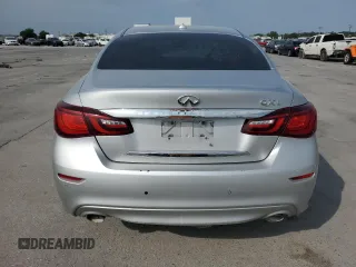 2015 Infiniti Q70 z VIN JN1BY1PR5FM832000, wystawiony jako Copart lot #56699885 z przebiegiem Nie podano mil oraz Szkody całkowita. Historia ofert i sprzedaży dostępna na DreamBid. Obrazek 6.