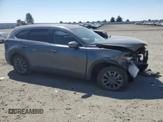 2021 Mazda CX-9 Sport with VIN JM3TCBBY9M0527244, listed as a Copart auction lot 64231384 with Not Provided miles and Salvage Title. Bid and sale history available at DreamBid. Image 4.
