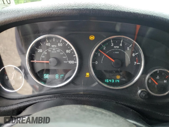 2013 Jeep Wrangler Sport with VIN 1C4AJWAG6DL576549, listed as a Copart auction lot 59888965 with 164,314 mi miles and Salvage title. Bid and sale history available at DreamBid. Image 9.