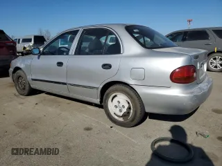1996 Hyundai Accent z VIN KMHVF14N4TU316378, wystawiony jako Copart lot #88981945 z przebiegiem 128 650 mil mil oraz Tytuł czysty. Historia ofert i sprzedaży dostępna na DreamBid. Obrazek 2.