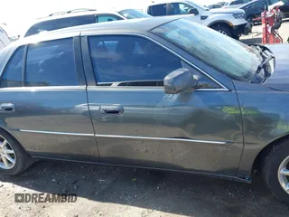 2011 Cadillac DTS Premium Collection z VIN 1G6KH5E68BU124852, wystawiony jako IAAI lot #41652793 z przebiegiem 227 148 mil mil oraz . Historia ofert i sprzedaży dostępna na DreamBid. Obrazek 14.