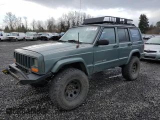 2000 Jeep Cherokee Classic with VIN 1J4FF58S3YL104384, listed as a Copart auction lot 46645415 with 253,730 mi miles and Salvage Title. Bid and sale history available at carsss.com. Image 1.