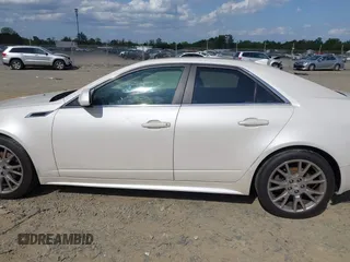 2013 Cadillac CTS Premium z VIN 1G6DS5E3XD0106332, wystawiony jako IAAI lot #42152577 z przebiegiem 114 700 mil mil oraz . Historia ofert i sprzedaży dostępna na DreamBid. Obrazek 14.