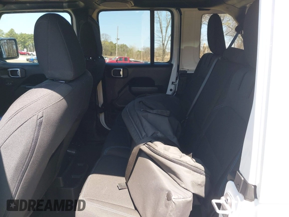 2023 Jeep Wrangler Rubicon with VIN 1C4JJXR68PW584303, listed as a IAAI auction lot 42049098 with 29,565 mi miles and . Bid and sale history available at DreamBid. Image 8.