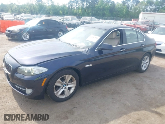 2013 BMW 5 Series 528i with VIN WBAXG5C52DD230956, listed as a IAAI auction lot 42107778 with 126,377 mi miles and . Bid and sale history available at carsss.com. Image 2.