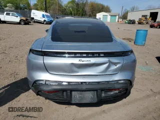 2022 Porsche Taycan z VIN WP0AA2Y19NSA15847, wystawiony jako Copart lot #54012535 z przebiegiem 28 002 mil mil oraz Szkody całkowita. Historia ofert i sprzedaży dostępna na DreamBid. Obrazek 6.