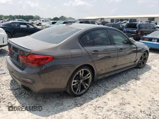 2020 BMW 5 Series M550i xDrive with VIN WBAJS7C08LCD82431, listed as a Copart auction lot 59518835 with 33,184 mi miles and Salvage title. Bid and sale history available at DreamBid. Image 3.