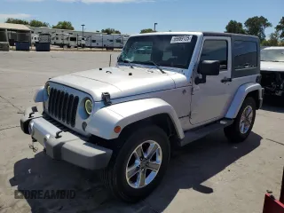 2009 Jeep Wrangler Sahara with VIN 1J4FA54149L708183, listed as a Copart auction lot 65989125 with 133,436 mi miles and Salvage title. Bid and sale history available at DreamBid. Image 1.
