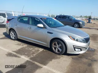 2015 Kia Optima LX z VIN 5XXGM4A70FG450728, wystawiony jako IAAI lot #42217351 z przebiegiem 113 318 mil mil oraz . Historia ofert i sprzedaży dostępna na DreamBid. Obrazek 1.