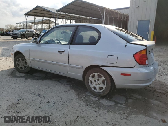 2003 Hyundai Accent GL z VIN KMHCG35CX3U270374, wystawiony jako Copart lot #47240325 z przebiegiem 122 739 mil mil oraz Szkoda całkowita • Salvage title. Historia ofert i sprzedaży dostępna na DreamBid. Obrazek 2.
