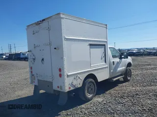 2012 Ford Super Duty F-250 SRW XL with VIN 1FDBF2B62CEB18607, listed as a IAAI auction lot 41995836 with 597,268 mi miles. Bid and sale history available at carsss.com. Image 4.