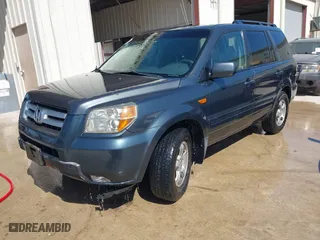 2006 Honda Pilot EX-L with VIN 5FNYF28556B003516, listed as a IAAI auction lot 42013495 with 207,443 mi miles. Bid and sale history available at carsss.com. Image 2.