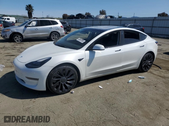 2021 Tesla Model 3 Performance with VIN 5YJ3E1ECXMF091342, listed as a Copart auction lot 49987595 with 120,881 mi miles and Salvage Title. Bid and sale history available at DreamBid. Image 1.
