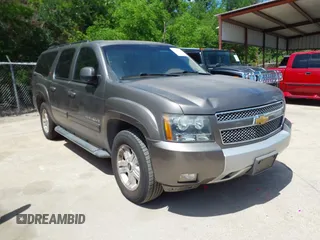 2013 Chevrolet Suburban LT with VIN 1GNSCJE03DR337592, listed as a IAAI auction lot 42101370 with 204,311 mi miles. Bid and sale history available at carsss.com. Image 1.