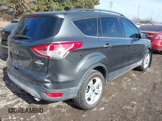2016 Ford Escape SE with VIN 1FMCU0GX1GUC19942, listed as a IAAI auction lot 41504587 with 142,122 mi miles. Bid and sale history available at carsss.com. Image 4.
