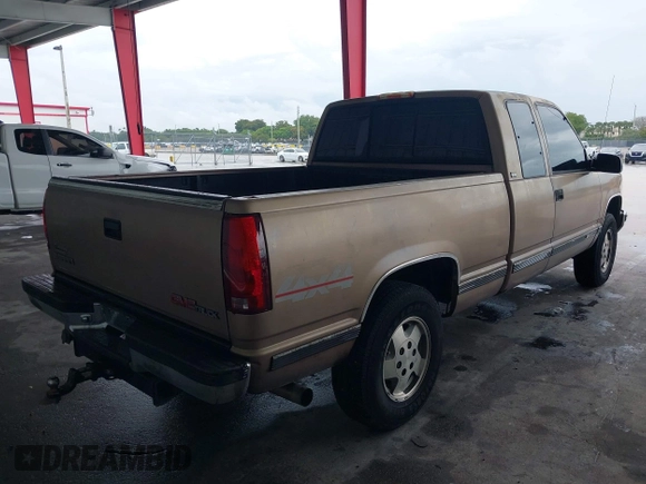 1995 GMC Sierra 1500 z VIN 2GTEK19K1S1535176, wystawiony jako IAAI lot #42243366 z przebiegiem 220 755 mil mil oraz . Historia ofert i sprzedaży dostępna na DreamBid. Obrazek 4.