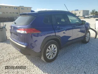2023 Toyota Corolla Cross LE with VIN 7MUCAAAG0PV063737, listed as a Copart auction lot 86267914 with 13,740 mi miles and Salvage title. Bid and sale history available at DreamBid. Image 3.