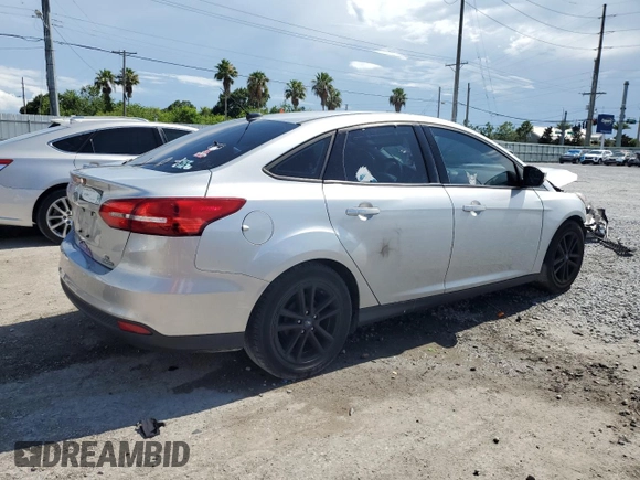 2016 Ford Focus SE z VIN 1FADP3F24GL309119, wystawiony jako Copart lot #62279095 z przebiegiem 117 535 mil mil oraz Szkoda całkowita • Salvage title. Historia ofert i sprzedaży dostępna na DreamBid. Obrazek 3.