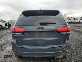 2018 Jeep Grand Cherokee Altitude with VIN 1C4RJFAG5JC219944, listed as a Copart auction lot 52030365 with 99,463 mi miles and Salvage title. Bid and sale history available at DreamBid. Image 6.