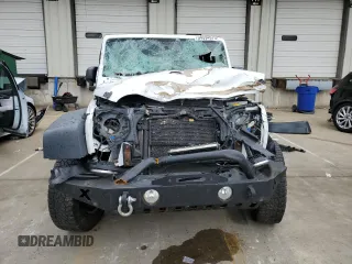2013 Jeep Wrangler Unlimited Sport RHD with VIN 1C4BJWKG9DL689639, listed as a Copart auction lot 54594975 with 256,837 mi miles and Salvage title. Bid and sale history available at DreamBid. Image 5.
