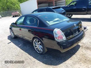 2006 Nissan Altima 2.5 with VIN 1N4AL11D96N334595, listed as a IAAI auction lot 42004783 with 166,683 mi miles. Bid and sale history available at carsss.com. Image 3.