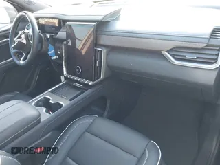 2024 GMC Acadia AWD Denali z VIN 1GKENRKSXRJ198804, wystawiony jako IAAI lot #41354344 z przebiegiem 4 144 mil mil oraz . Historia ofert i sprzedaży dostępna na DreamBid. Obrazek 5.