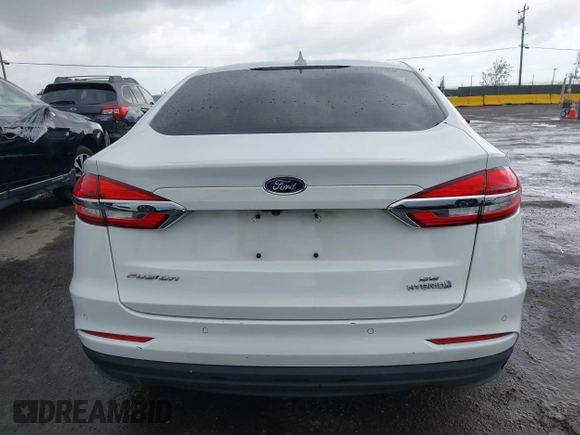 2019 Ford Fusion Hybrid SE with VIN 3FA6P0LU9KR206740, listed as a IAAI auction lot 41933661 with 143,111 mi miles. Bid and sale history available at carsss.com. Image 16.