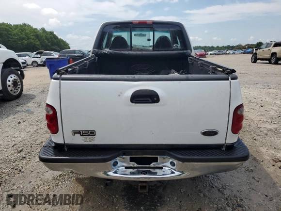2001 Ford F-150 XL with VIN 1FTRX08L51KE49004, listed as a Copart auction lot 60470745 with 199,490 mi miles and Salvage title. Bid and sale history available at DreamBid. Image 6.