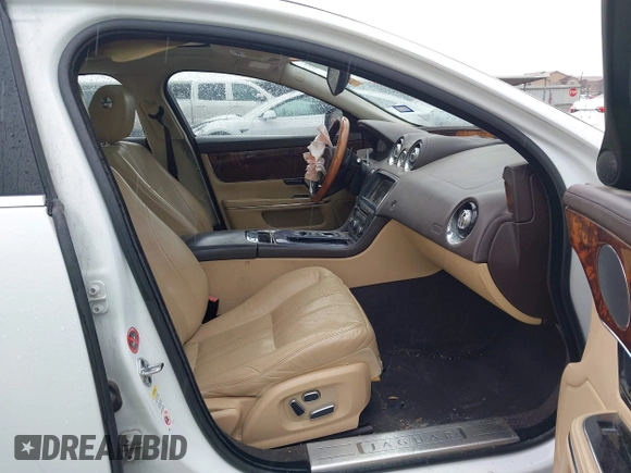 2012 Jaguar XJ with VIN SAJWA1CB7CLV35339, listed as a IAAI auction lot 41945850 with 123,501 mi miles and . Bid and sale history available at DreamBid. Image 5.