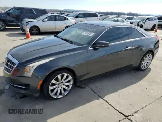 2015 Cadillac ATS Standard AWD z VIN 1G6AG1RXXF0122396, wystawiony jako Copart lot #88048185 z przebiegiem 136 703 mil mil oraz Szkoda całkowita • Salvage title. Historia ofert i sprzedaży dostępna na DreamBid. Obrazek 1.